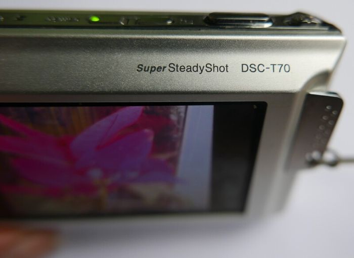 Sony Cyber-shot DSC-T70 8.1MP Digital Camera - Silver + charger works well