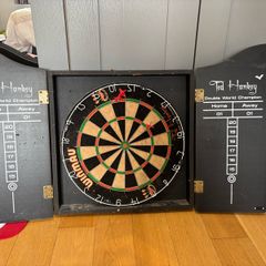 dartboard in cabinet