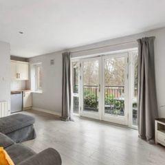 Ikea grey curtains and pole