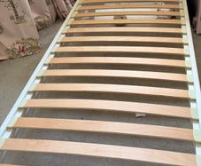 Wooden Single bed with Pink Headboard