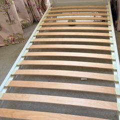 Wooden Single bed with Pink Headboard