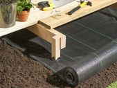 patio decking underlay bark mulch chippings stones slabs flower beds ground cover landscaping fabric