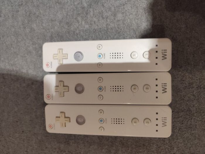 Three Nintendo Wii Original controllers