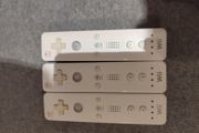 Three Nintendo Wii Original controllers