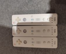 Three Nintendo Wii Original controllers