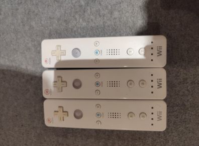 Three Nintendo Wii Original controllers