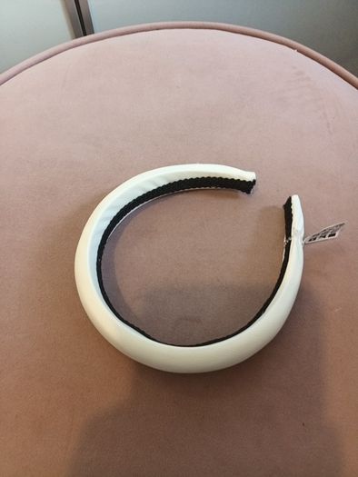 Cream satin hair band was 9.99