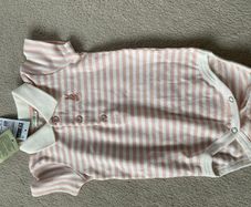 Baby outfits and soothers