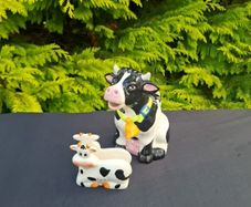 By post only cow duo ornaments