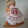 3 Leonardo Collection porcelain dolls with stands / rocking horse display collectors dolls. Image 2