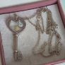Pandora sterling silver key necklace with a heart,shaped floating locket and pink sparkling stones. Includes the two petite charms Image 2