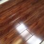 New 12mm High Gloss Calgary Walnut Flooring Image 4