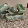 Lot of 5 Irish Carraig Ware items, including three planters. Image 2