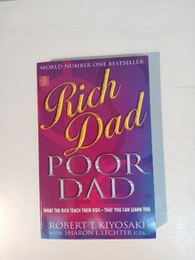 Rich Dad Poor Dad by Robert T. Kiyosaki with Sharon L. Lechter