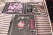 3 - Metal Cd's.
