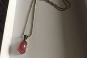 rose quartz stone in silver pendent