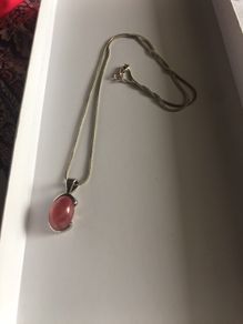 rose quartz stone in silver pendent