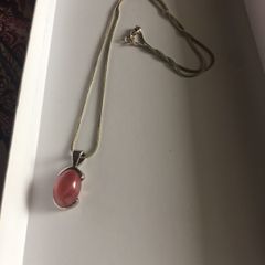 rose quartz stone in silver pendent