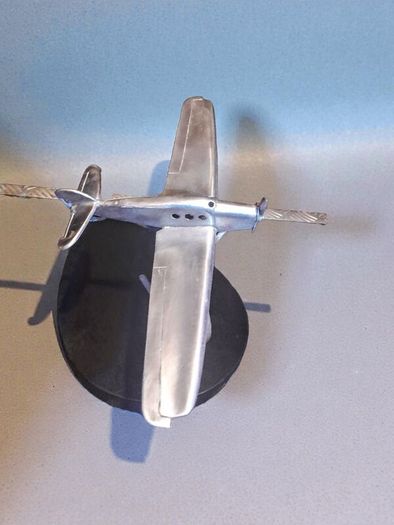 1970s chrome airplane on stand