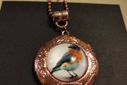Handmade rosegold robin locket
