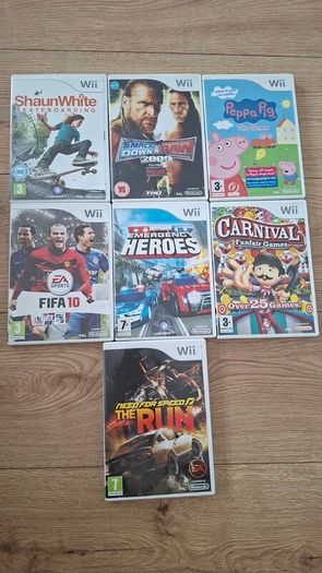 Nintendo wii 2 pads and 7 Games