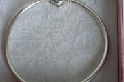 Pandora Moments encircled clasp bangle openwork swirl clasp holding a sparkling center crystal in great condition