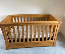 Mommas and poppas cot and changing unit.
