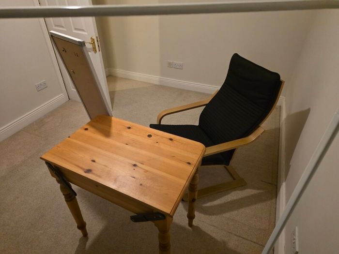 table , chair , mirror and cloths
