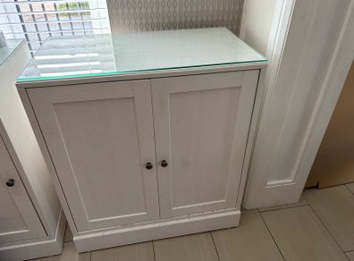Solid wood cabinet in white with glass top
