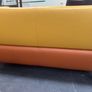 Yellow and orange couch Image 4