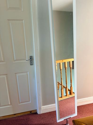 Rotating bathroom mirror cabinet