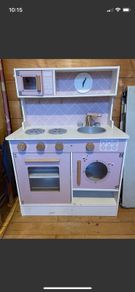 Wooden play kitchen with accessories