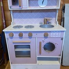 Wooden play kitchen with accessories