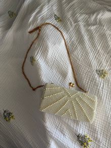 White pearl clutch
