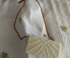 White pearl clutch