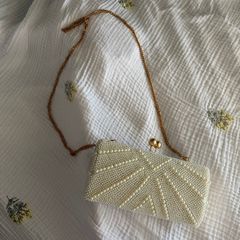 White pearl clutch