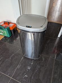 Large stainless steel bin with motion sensor open