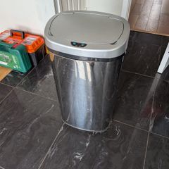 Large stainless steel bin with motion sensor open