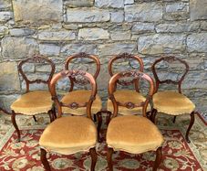 Set of 6 Victorian Walnut Balloon Back Dining Chairs.