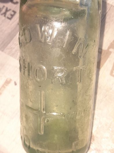 Antique Named Edwin Short Goole, Green Glass Codd Neck Bottle, featuring a marble invented in 1872