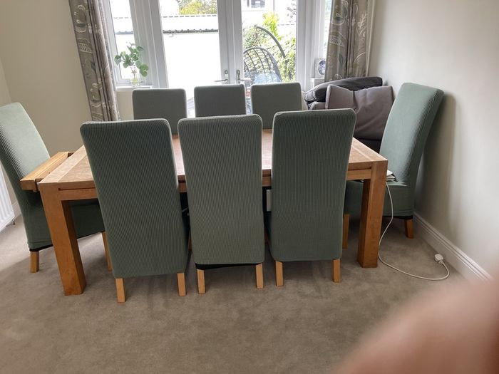 dining table and 8 leather chairs
