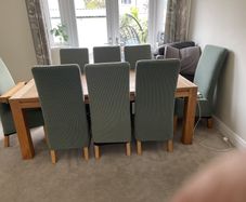 Solid oak dining table and 8 leather chairs