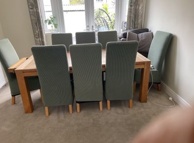 Solid oak dining table and 8 leather chairs