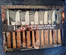 Brand new Fader steak knife and table fork set