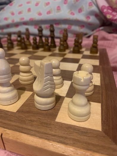 Boxed wooden chess board, prices and checkers set