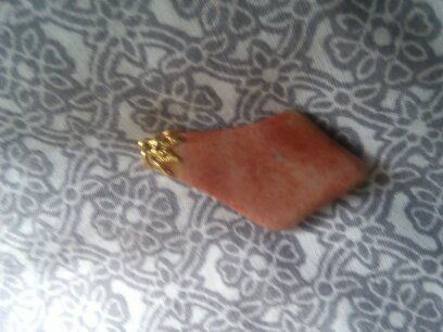 Necklace charm very nice and dressy .