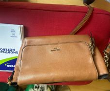dune brown or tan crossbody bag. Good condition.