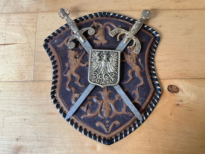Vintage Spanish-made wall plaque featuring a decorative coat of arms.