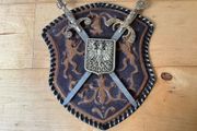 Vintage Spanish-made wall plaque featuring a decorative coat of arms.