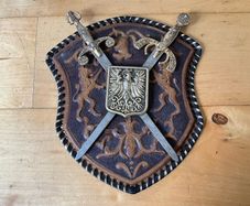 Vintage Spanish-made wall plaque featuring a decorative coat of arms.